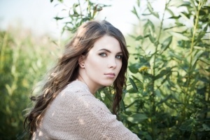 Pretty woman outdoors. Beautiful female model in organic cotton jouvelline